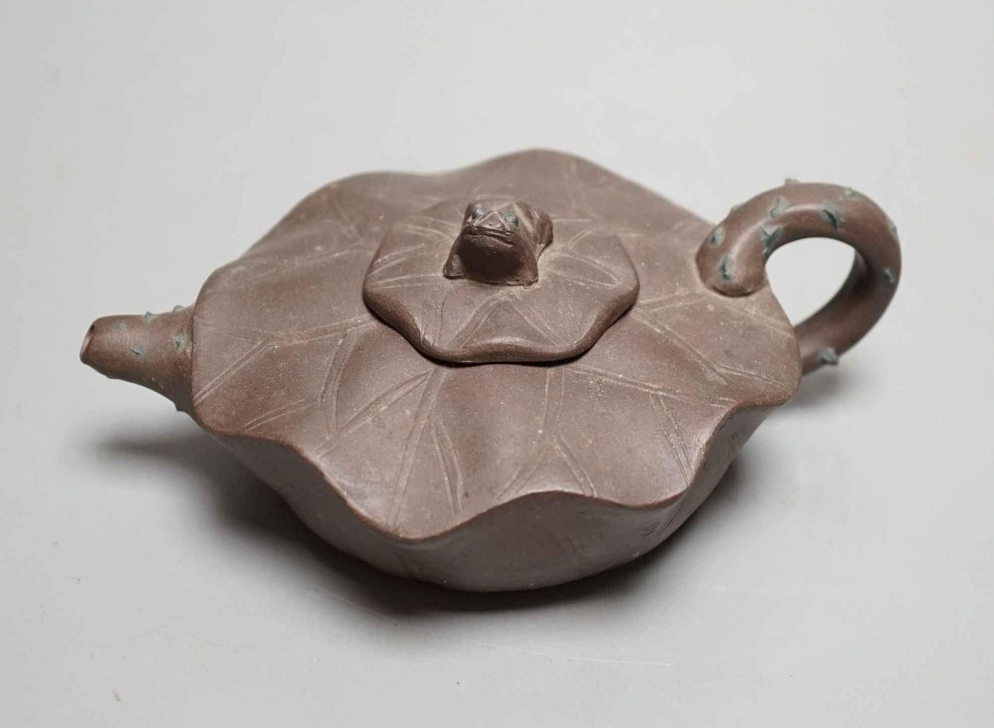 A Yixing clay teapot.